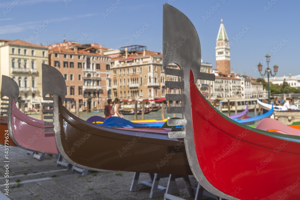 Beautiful bow of historic Venetian gondolas during the Historical Regatta on the Grand canal, Venice, Italy