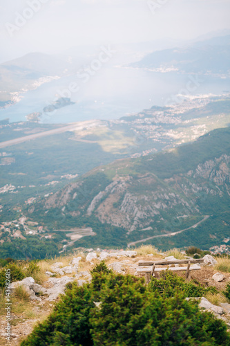 Benches on Mount Lovcen, overlooking the Bay of Kotor in Montenegro. © Nadtochiy