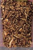 Black tea loose dried tea leaves with cinnamon, dried oranges