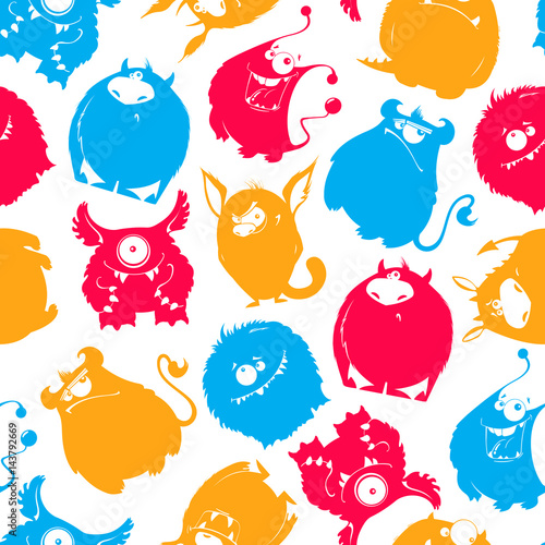 Seamless pattern of cartoon fluffy monsters
