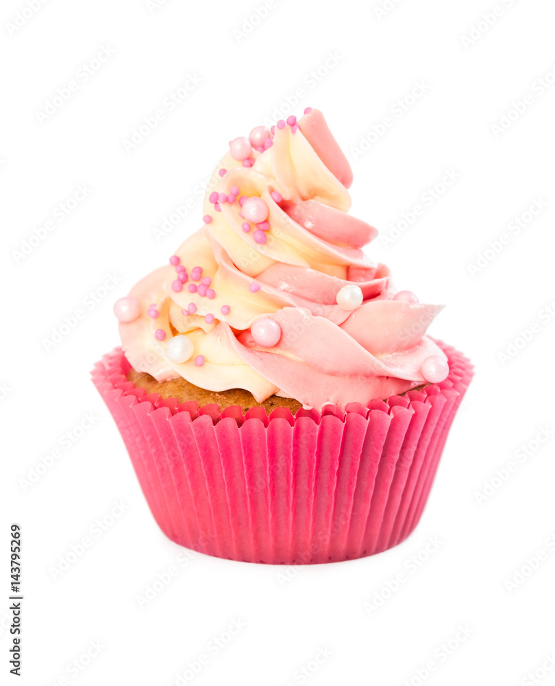 Cupcake with cream and decorative sprinkles Cupcake with cream and decorative sprinkles