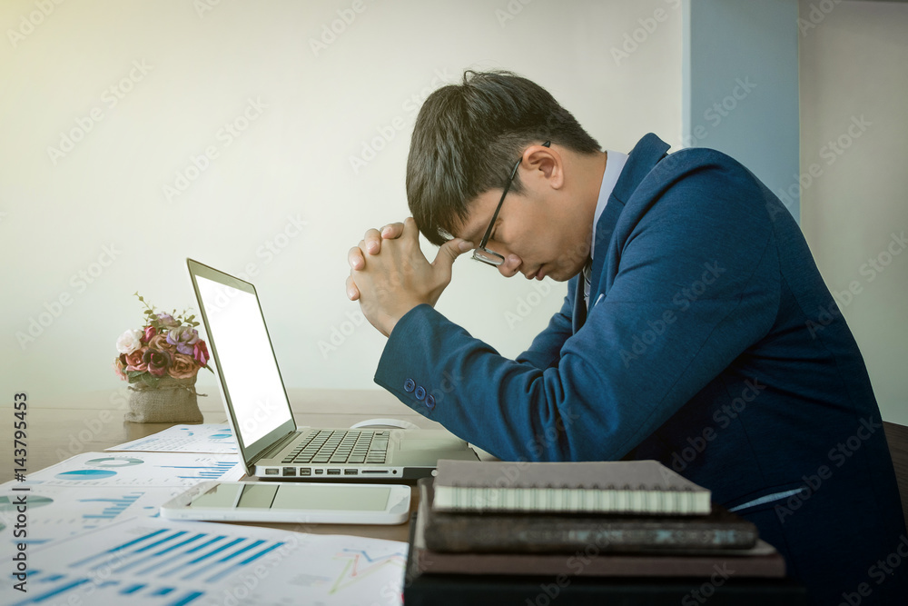 Businessman stressed out at work in casual office Businessman stressed out at work in casual office