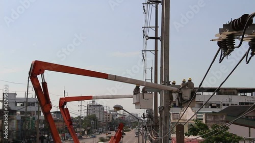 Construction Electrician Working Power Pole