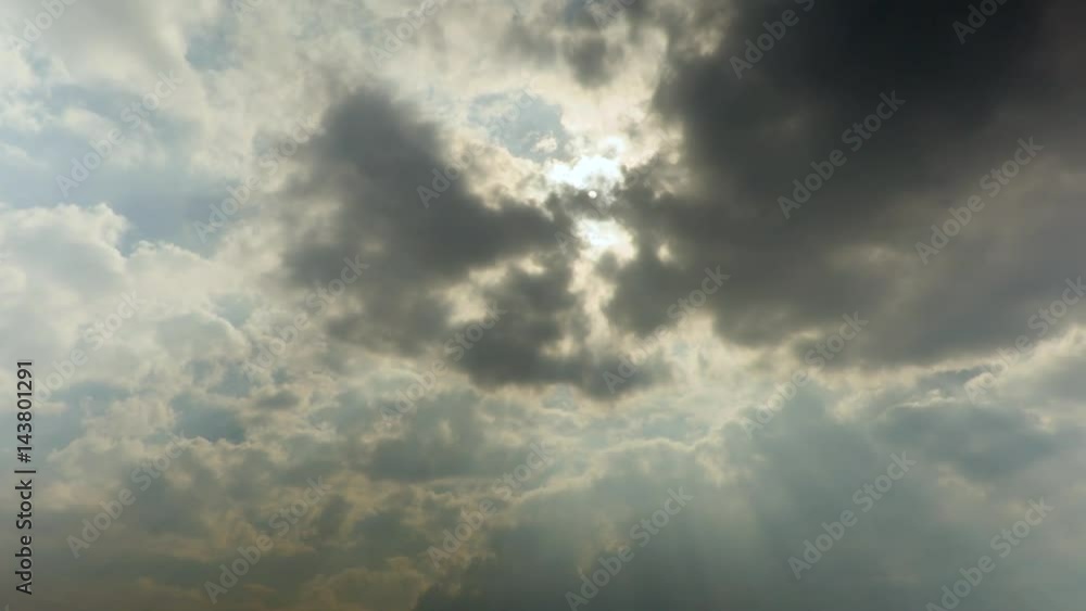 Sun rays through the clouds. Time-lapse recording. Footage 4K, UHD Sun rays through the clouds. Time-lapse recording. Footage 4K, UHD