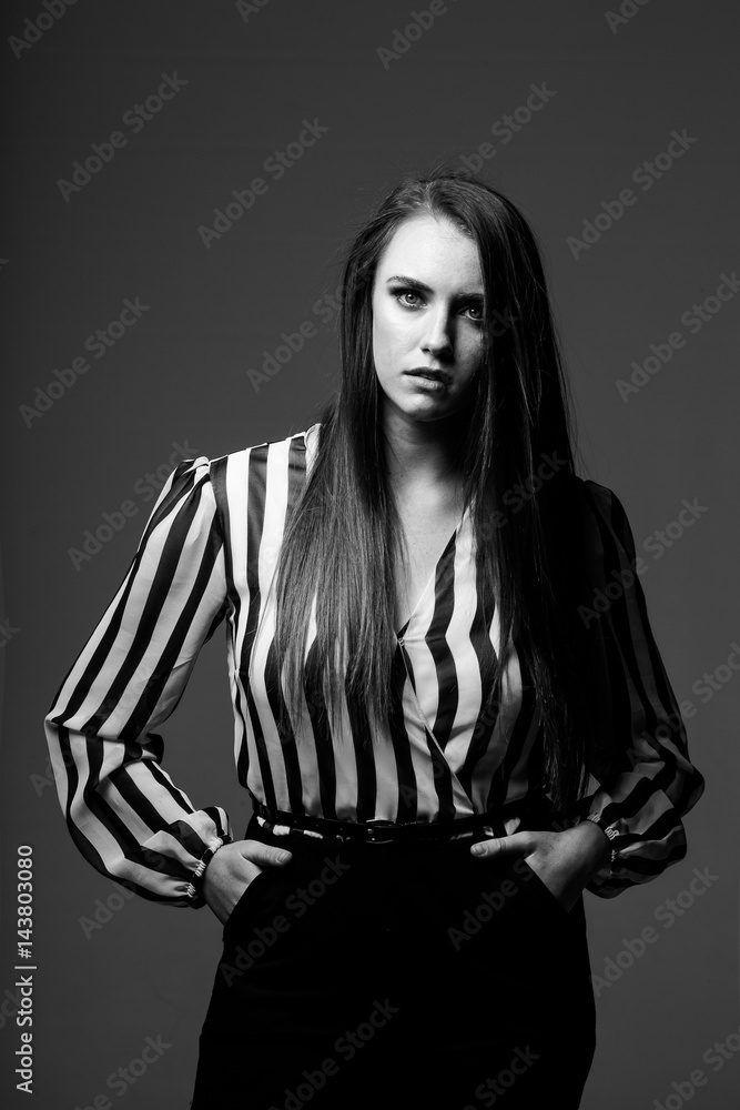 red head model with an edgy personality looking sexy in a dark studio with edgy lighting red head model with an edgy personality looking sexy in a dark studio with edgy lighting