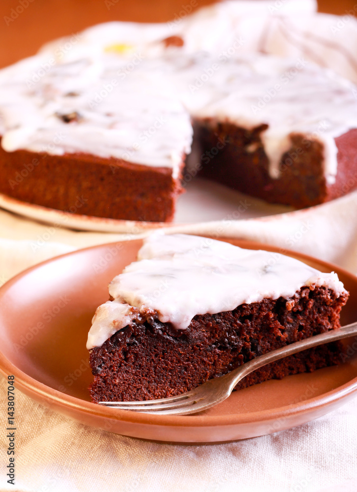 Chocolate and prune cake with white glaze Chocolate and prune cake with white glaze
