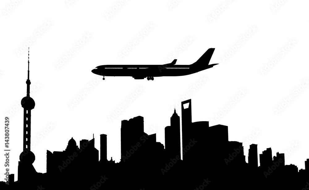silhouette of Shanghai and plane landing