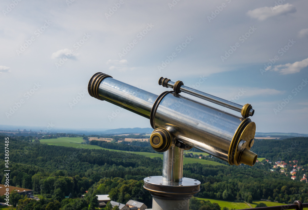 Spyglass on the viewing platform against sky Spyglass on the viewing platform against sky