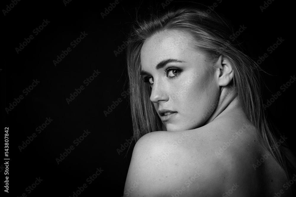 red head model with an edgy personality looking sexy in a dark studio with edgy lighting red head model with an edgy personality looking sexy in a dark studio with edgy lighting
