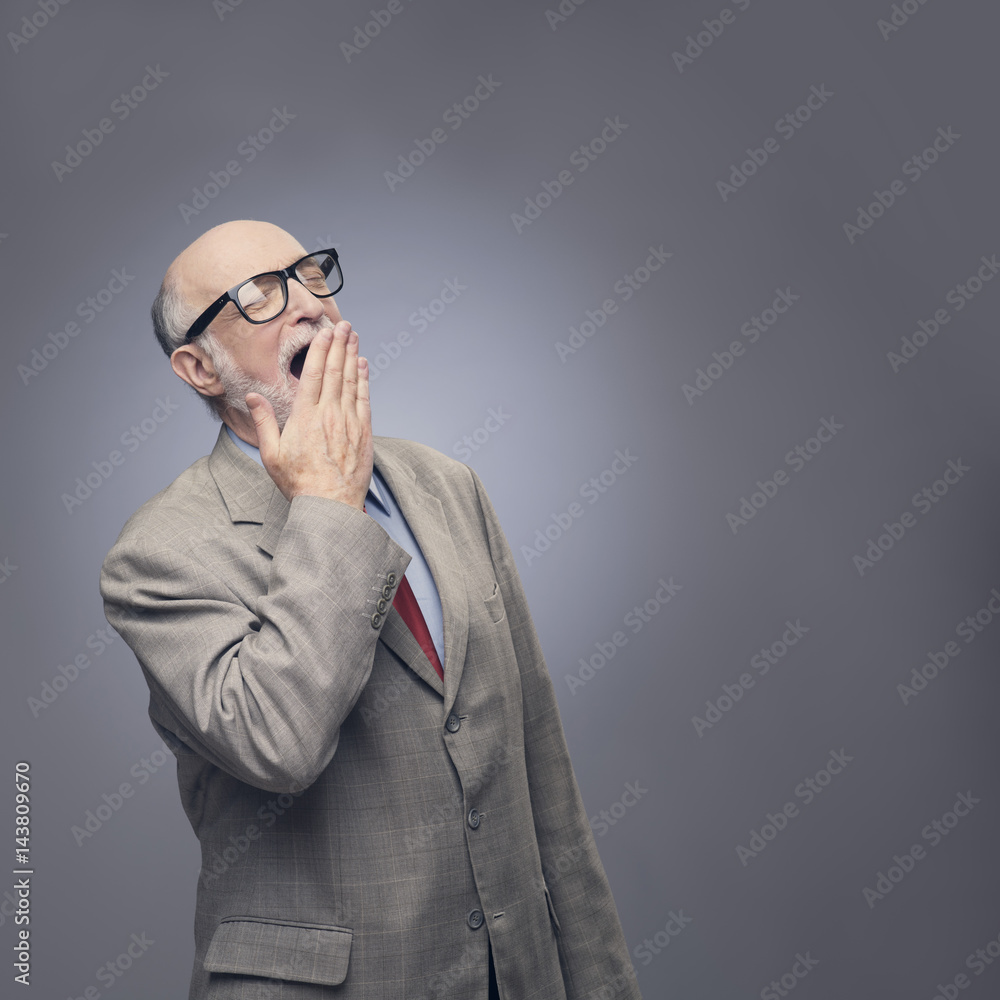 Yawning senior man Yawning senior man