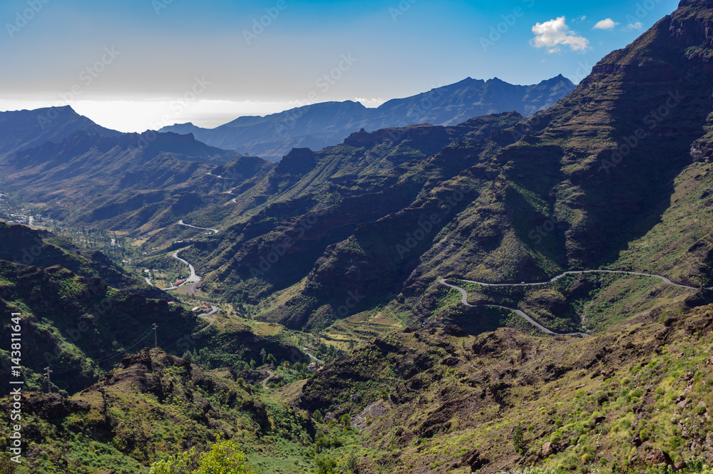 Mountain landscape in Gran Canaria: Barranco de Mogan and GC-200 road. Mountain landscape in Gran Canaria: Barranco de Mogan and GC-200 road.