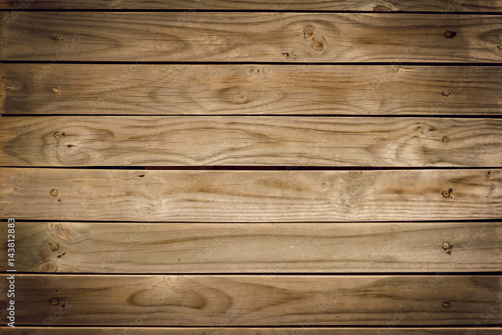 Old brown wooden wall, detailed background photo texture. Wood plank fence close up.