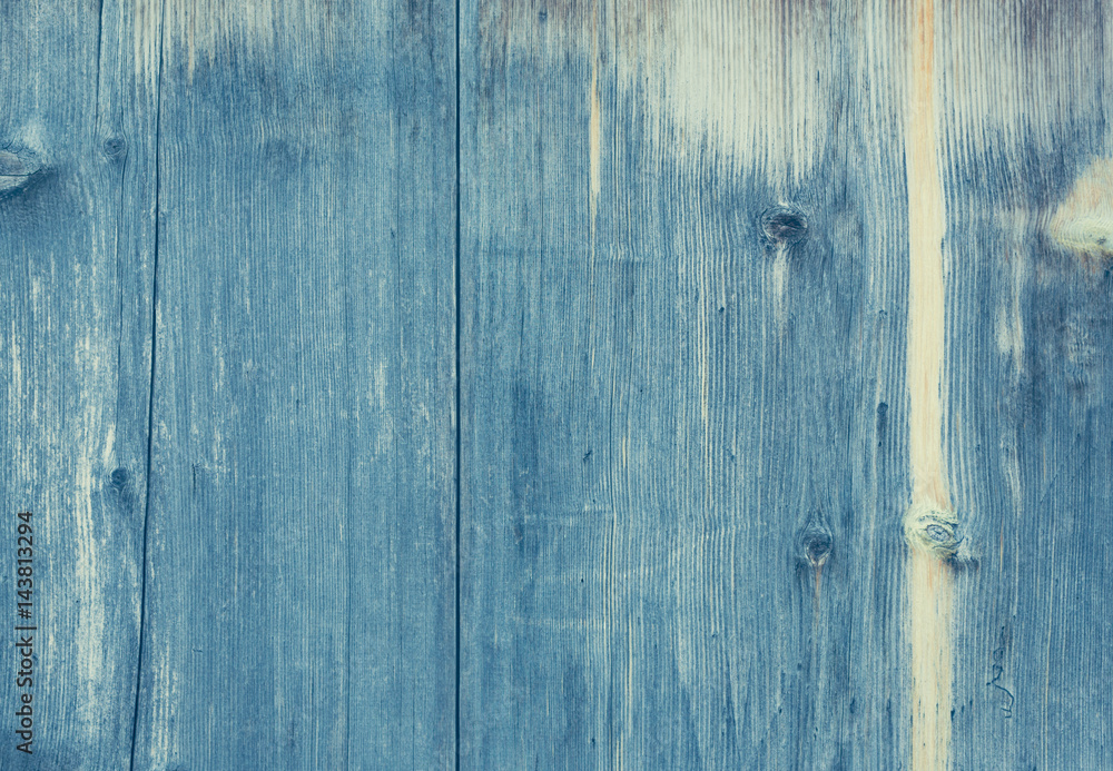 Old blue wooden wall, detailed background photo texture. Wood plank fence close up. Retro color style.