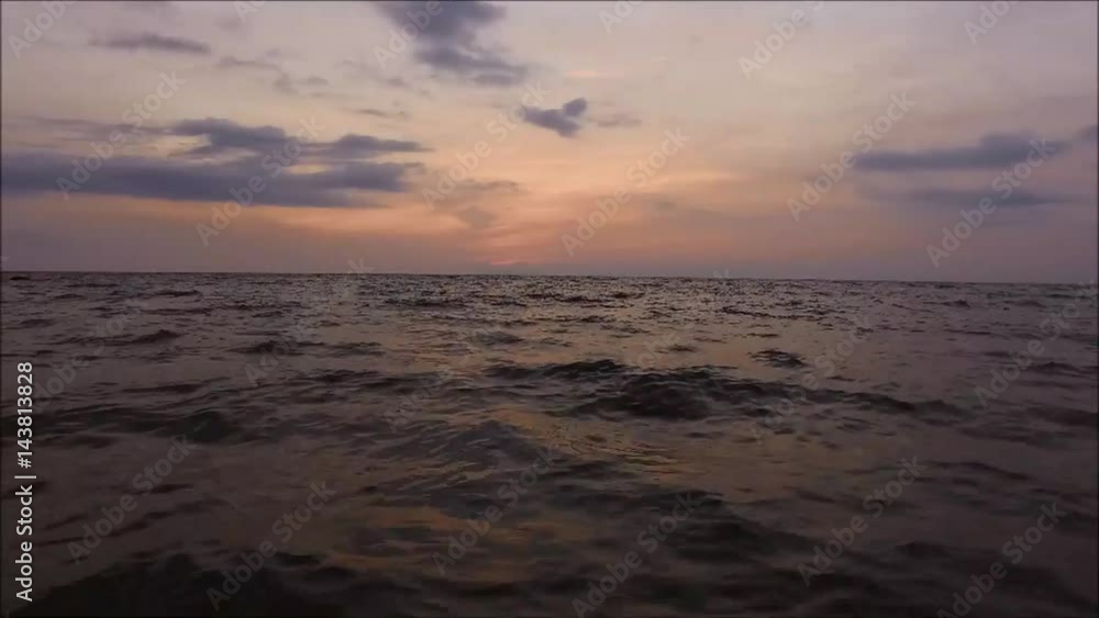 Purpler after sunset sky over the sea with gentle waves, Thailand Purpler after sunset sky over the sea with gentle waves, Thailand