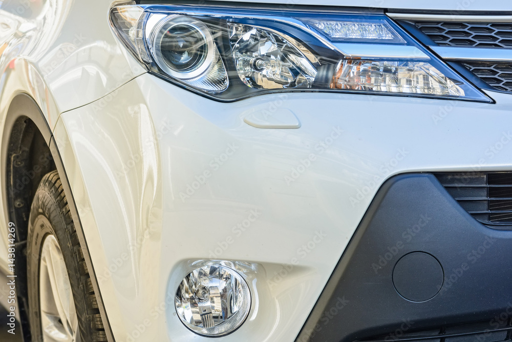 Close-up headlights of car