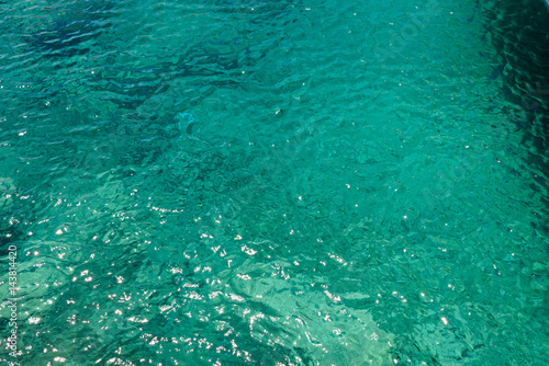 Obraz na płótnie Shining blue water ripple background. Clear sea water background. Photo from Zakynthos Island, Greece. w salonie