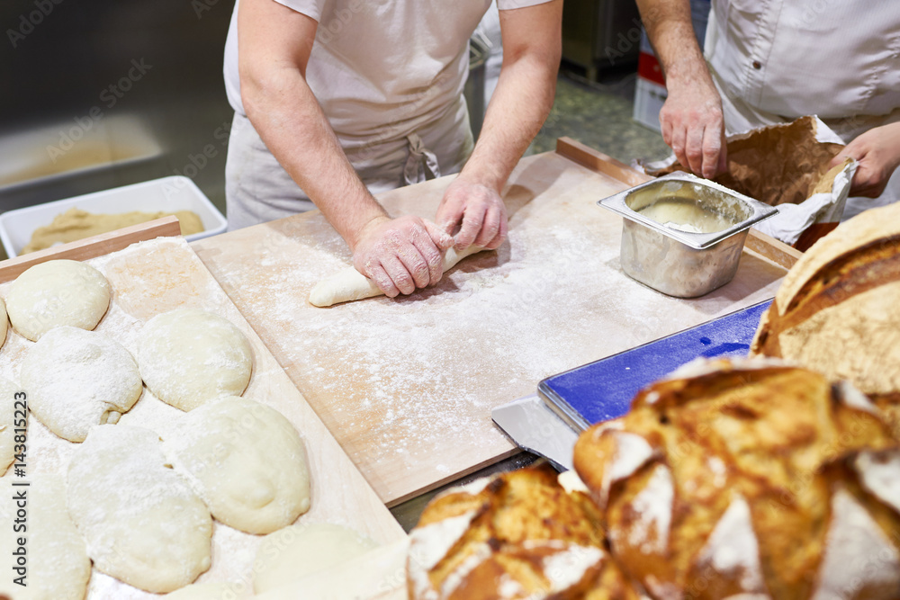 Kneading dough in bakery
