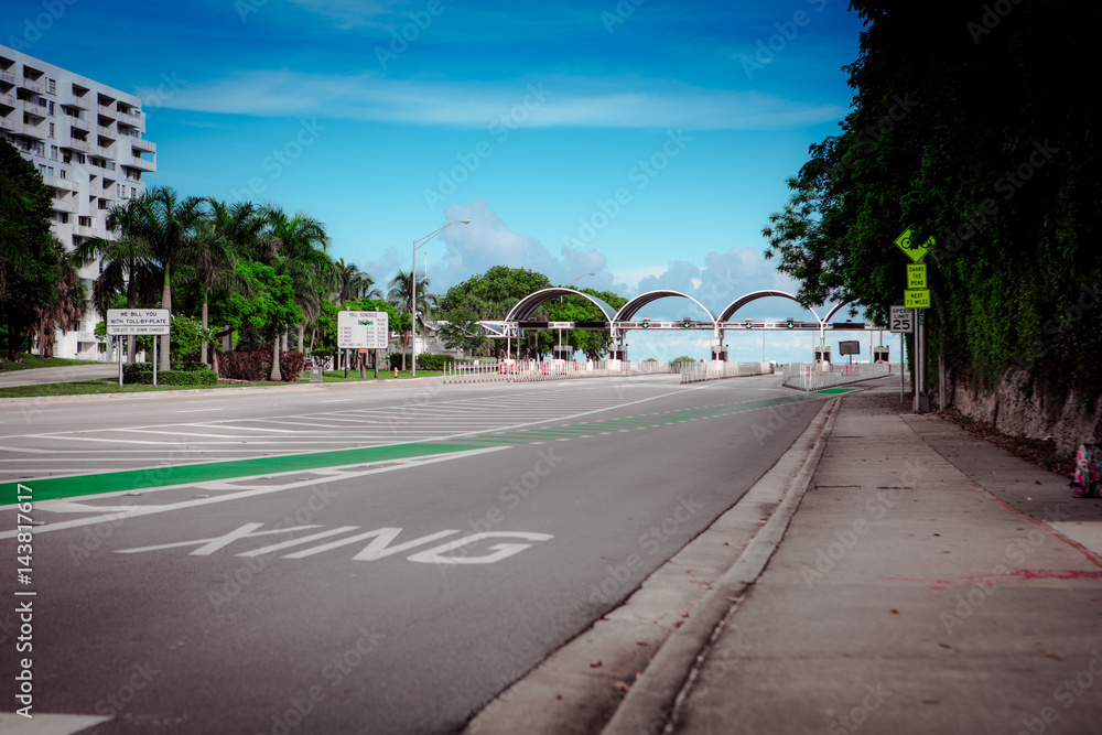 Bicycle lane signage on street for special bicycle road on Rickenbacker causeway for Key Biscayne. Near the ocean and Virginia Key. Miami. Florida. USA. Miami neighborhood.