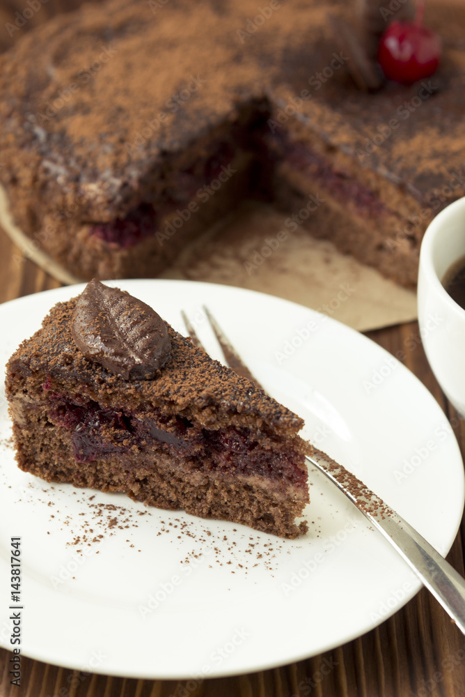 Piece of chocolate cake with cherry Piece of chocolate cake with cherry