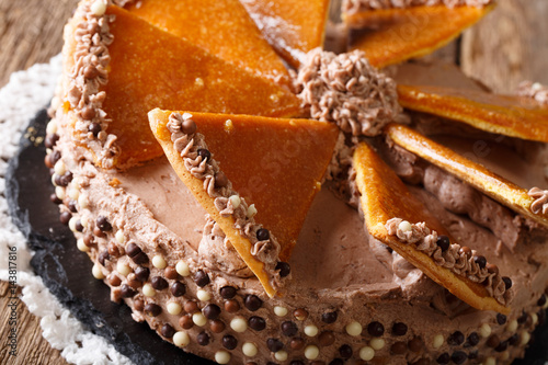 Traditional Hungarian Dobosh cake with caramel decoration macro. Horizontal photo