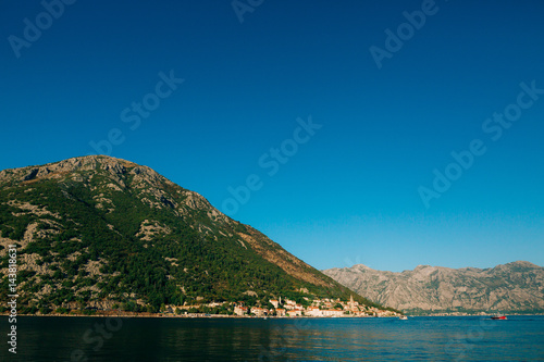 The old town of Perast on the shore of Kotor Bay, Montenegro. The ancient architecture of the Adriatic and the Balkans. Fishermen's cities of Europe. © Nadtochiy