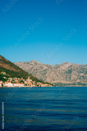 The old town of Perast on the shore of Kotor Bay, Montenegro. The ancient architecture of the Adriatic and the Balkans. Fishermen's cities of Europe.