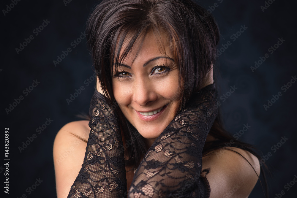 Fototapeta premium Close up photo from a cheerful middle aged woman