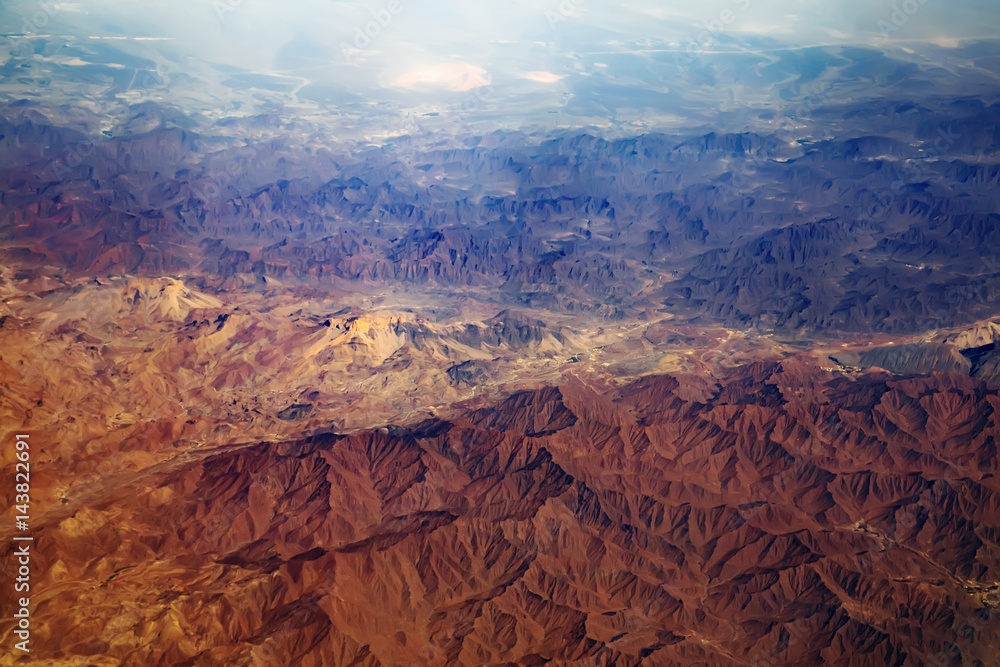 Aerial view from air plane of desert mountains