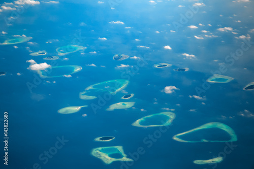 Aerial high angle view to tropical islands at Maldives