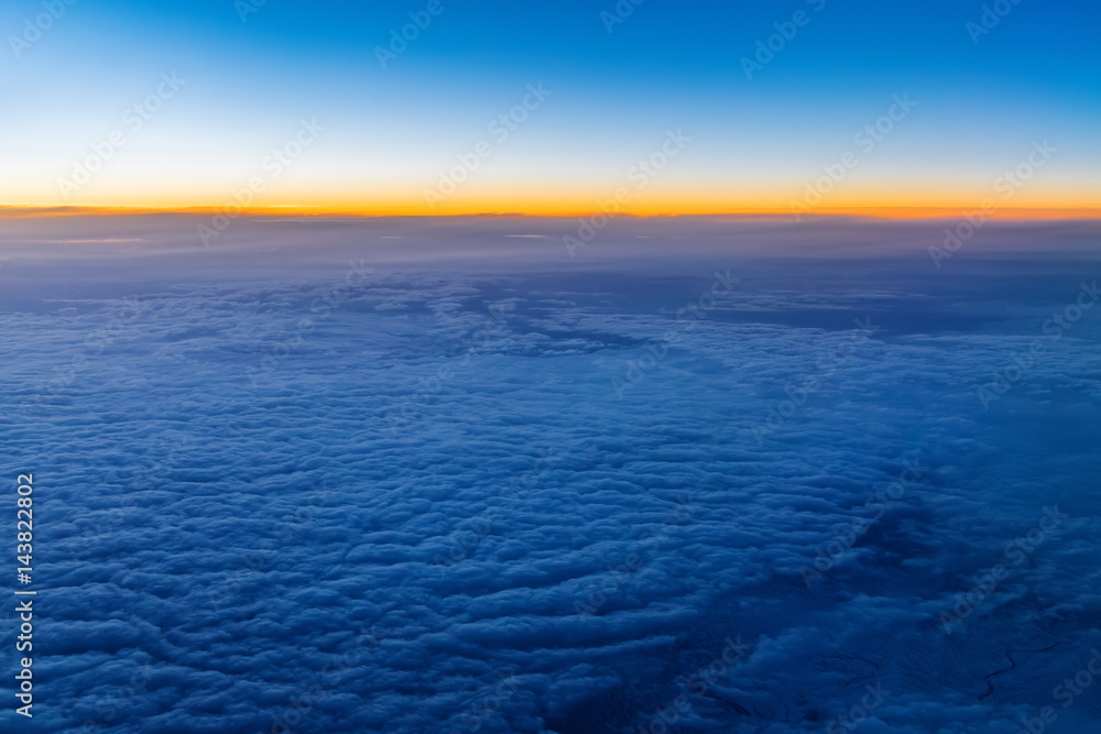 Aerial view from airplane window at twilight
