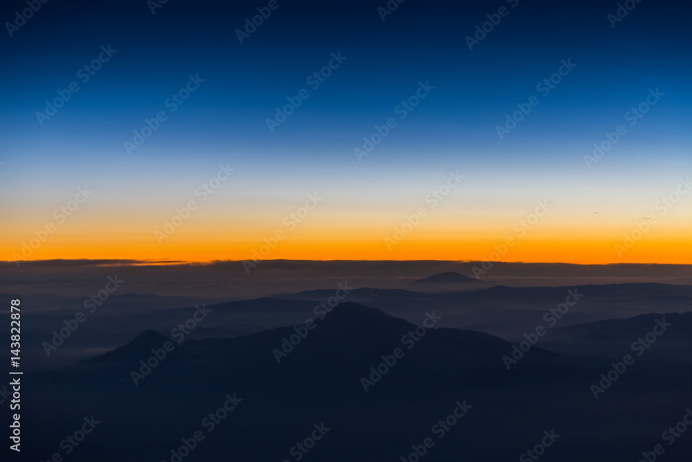Aerial view from airplane window at twilight