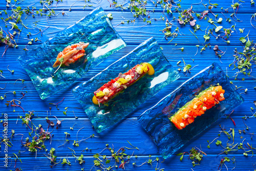 Fototapeta Naklejka Na Ścianę i Meble -  Salmon and Tuna Tartare with Anchovies