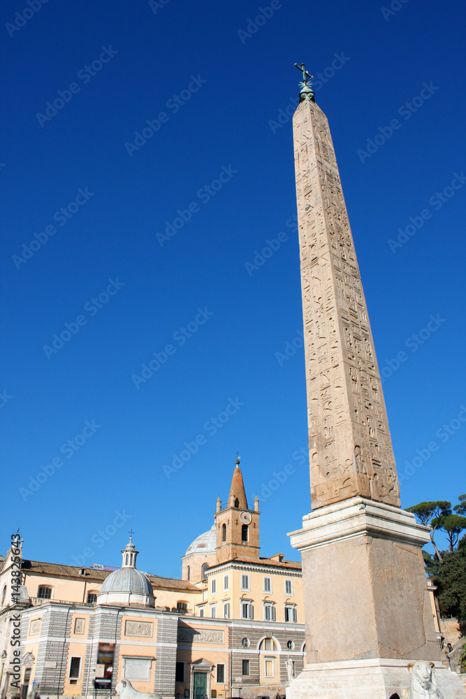 Egyptian Obelisk with star and cross in Piazza del Popolo in Rome Italy