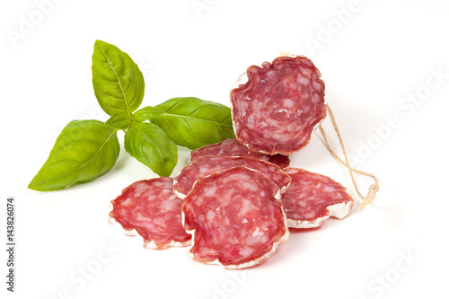 Salami sliced on the white background