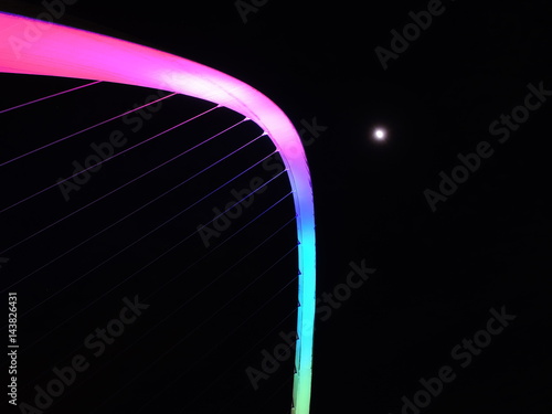 Newcastle upon Tyne, England, United Kingdom. The Gateshead Millennium Bridge and its colors during evening time photo