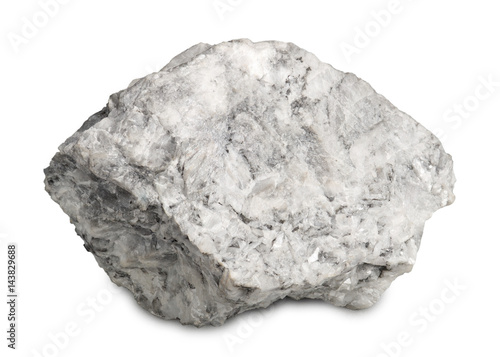 Mineral  magnesite isolated on white background. Magnesite are burnt to make magnesium oxide and used in jewelry-making,  in flooring material and as catalyst. photo