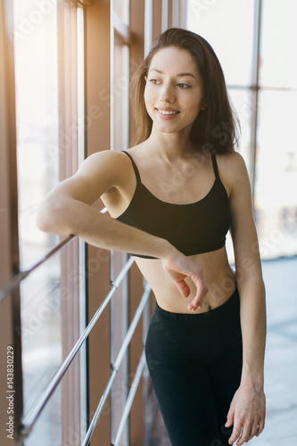 Young beautiful woman practicing yoga and gymnastic. Wellness concept. Classes in single sports.