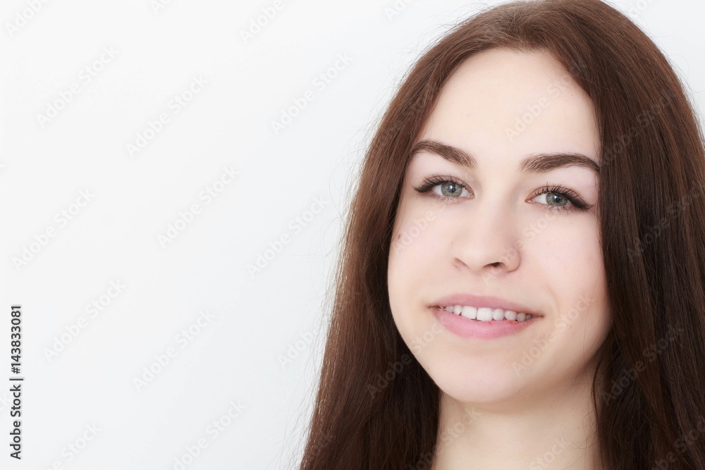 Young casual woman In pink blouse isolated over white background studio portrait Young casual woman In pink blouse isolated over white background studio portrait
