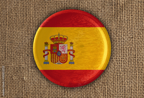 Spain Textured Round Flag wood on rough cloth photo