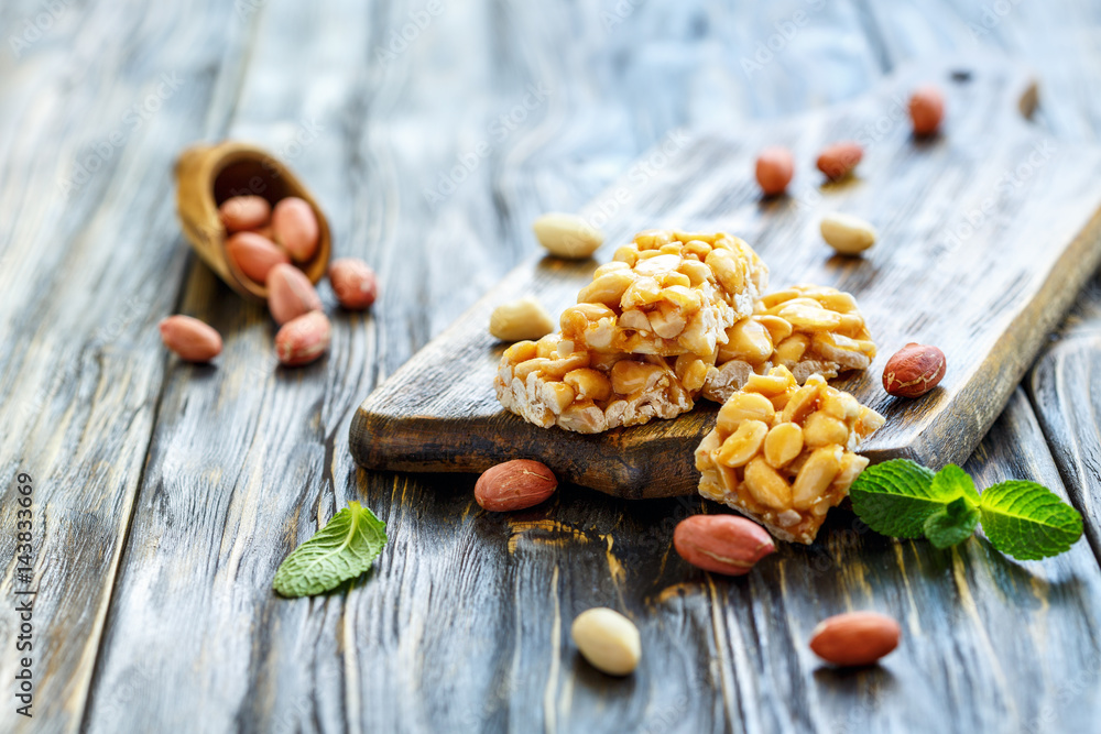 Fototapeta premium Peanuts in a honey glaze and a peanut.