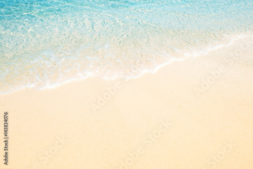 Soft wave of the sea on the sandy beach for background © bohbeh