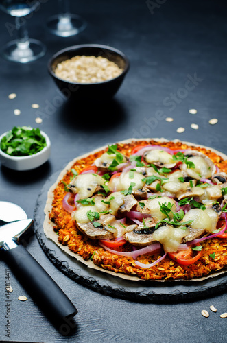 Sweet potato pizza crust with tomato, red onion and mushrooms