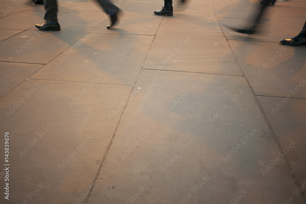 Commuters legs at rush hour