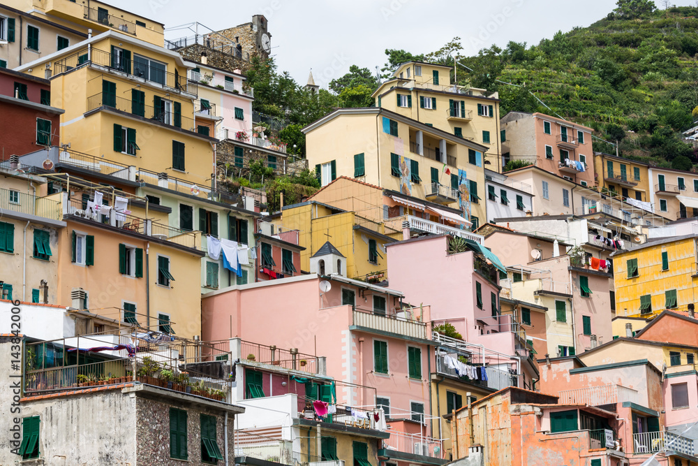 Colourful houses on Italian hillside by the Mediteranian Sea