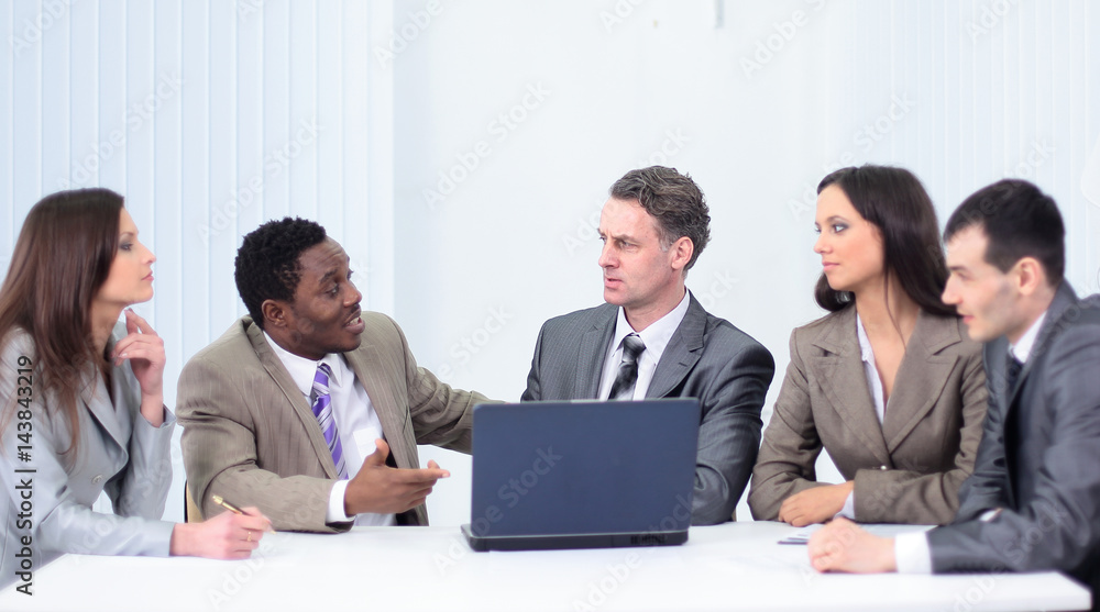 Business and office concept - smiling business team working in Business and office concept - smiling business team working in
