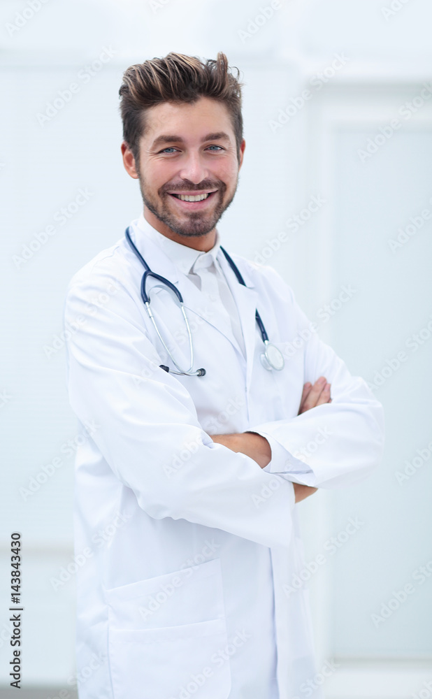 Portrait of a smiling doctor with a stethoscope around neck Portrait of a smiling doctor with a stethoscope around neck