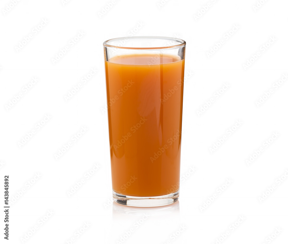 Carrot juice in a transparent cup on a white background. Isolated Carrot juice in a transparent cup on a white background. Isolated
