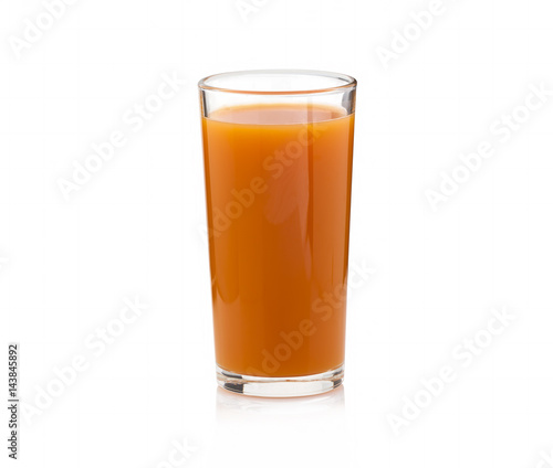 Carrot juice in a transparent cup on a white background. Isolated