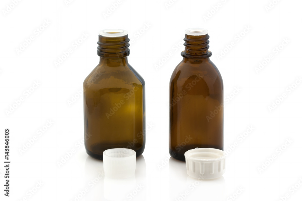 Vial of medicine without a lid on a white background