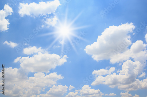 Sun with blue sky background.